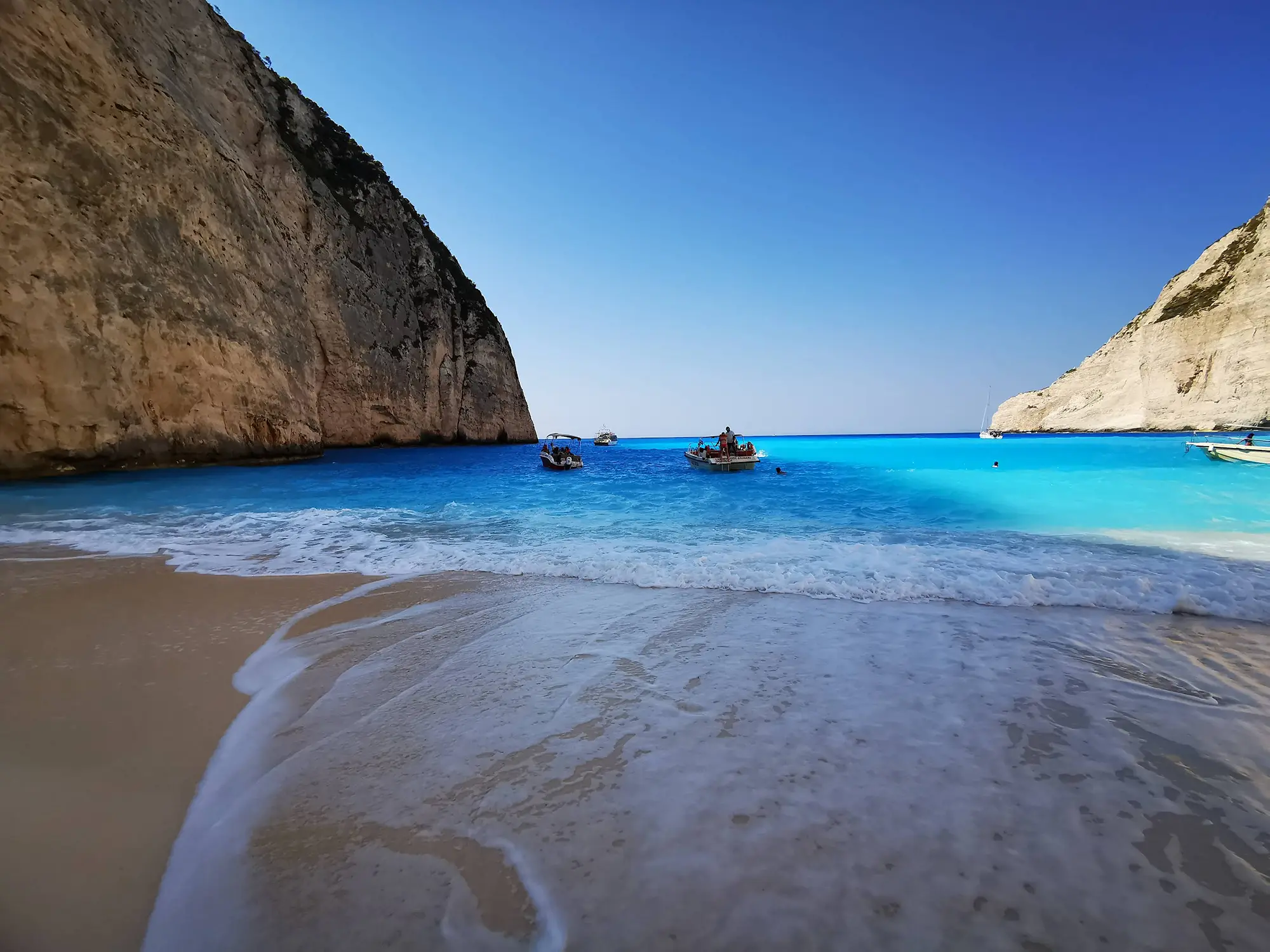 The iconic Navagio Shipwreck Beach in Zakynthos, the ultimate destination for our full-day private boat charters from Kefalonia