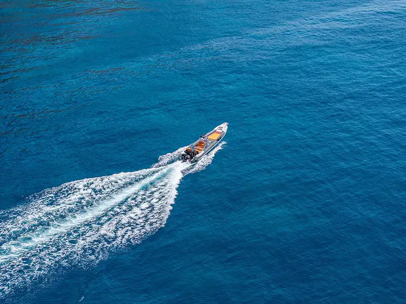 High-speed private sea taxi cutting through the deep blue Ionian Sea for a fast transfer between Kefalonia and Zante